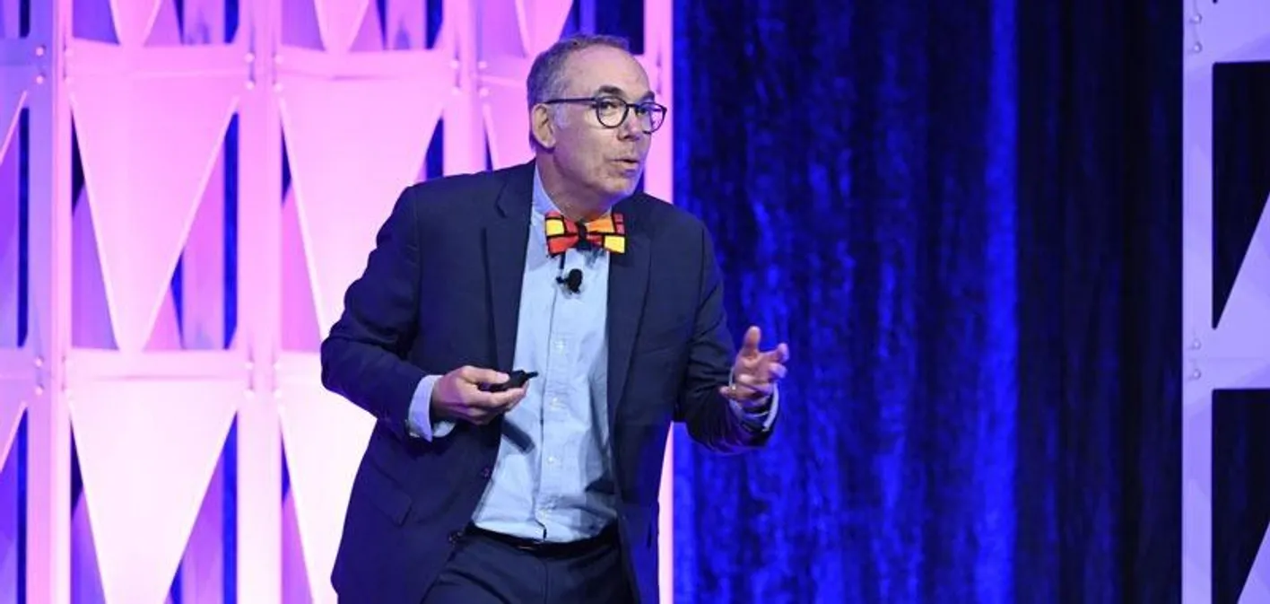 Keynote speaker onstage at IMEX