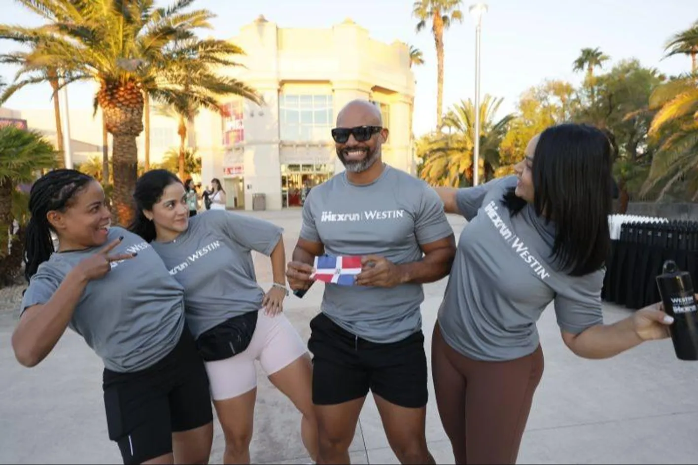 IMEX runners at the start line posing and smiling