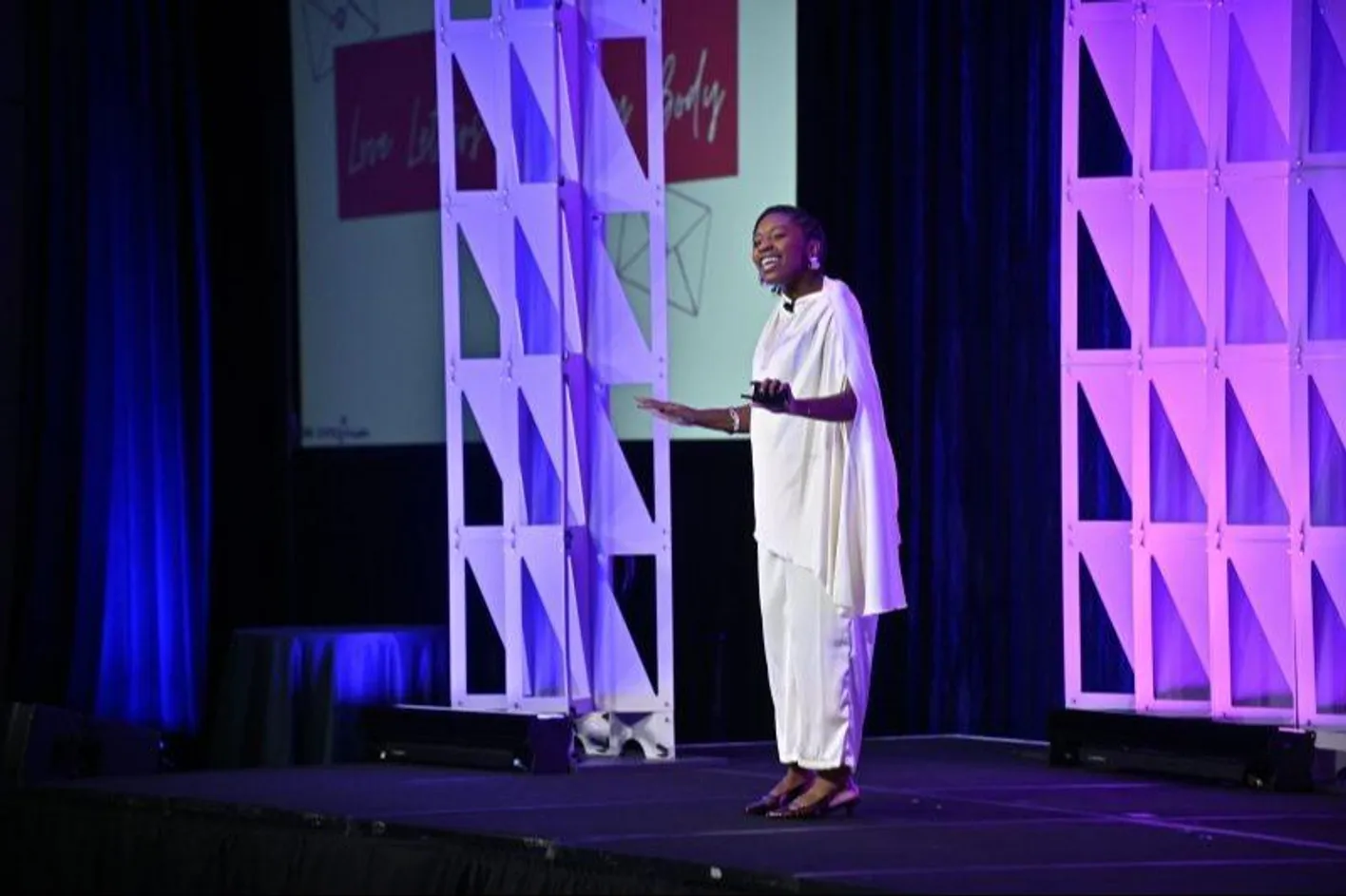 Speaker engaging corporate audience during an educational session