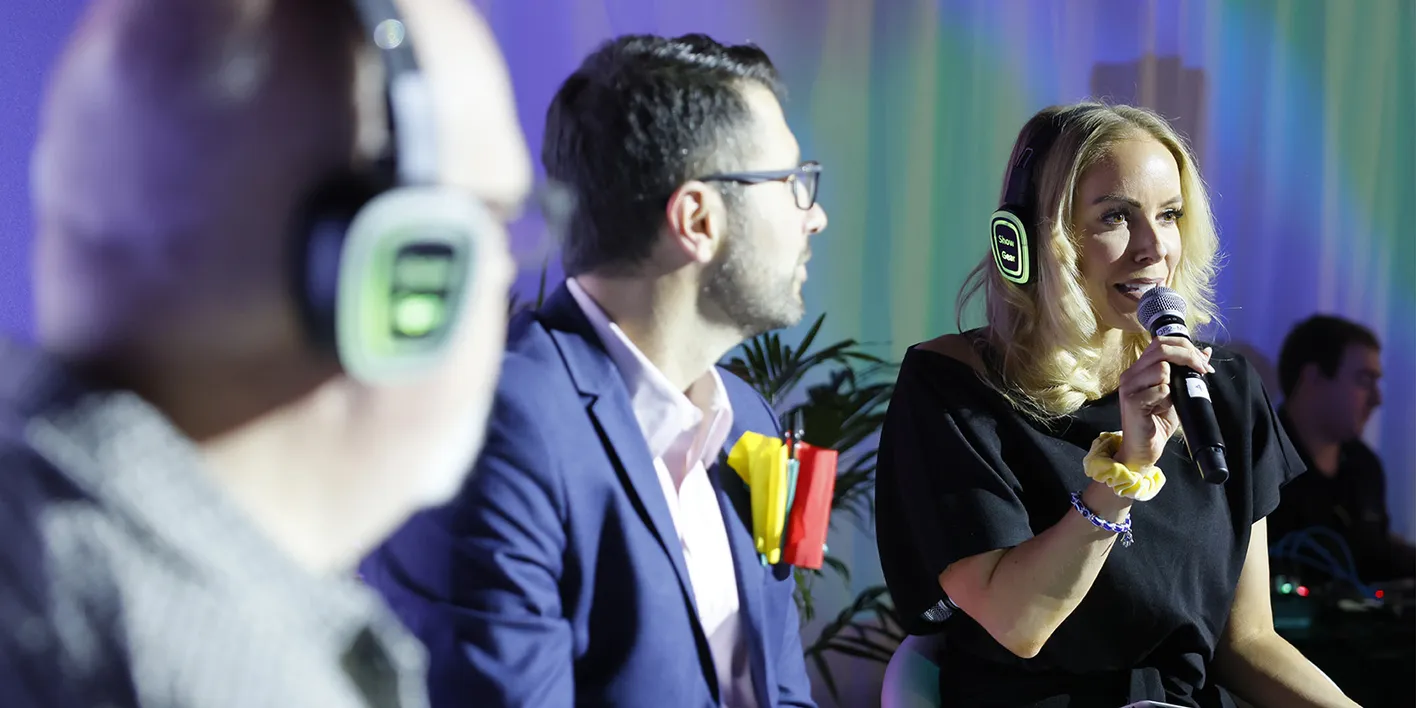 Speakers engaging in conversations about the future of live events