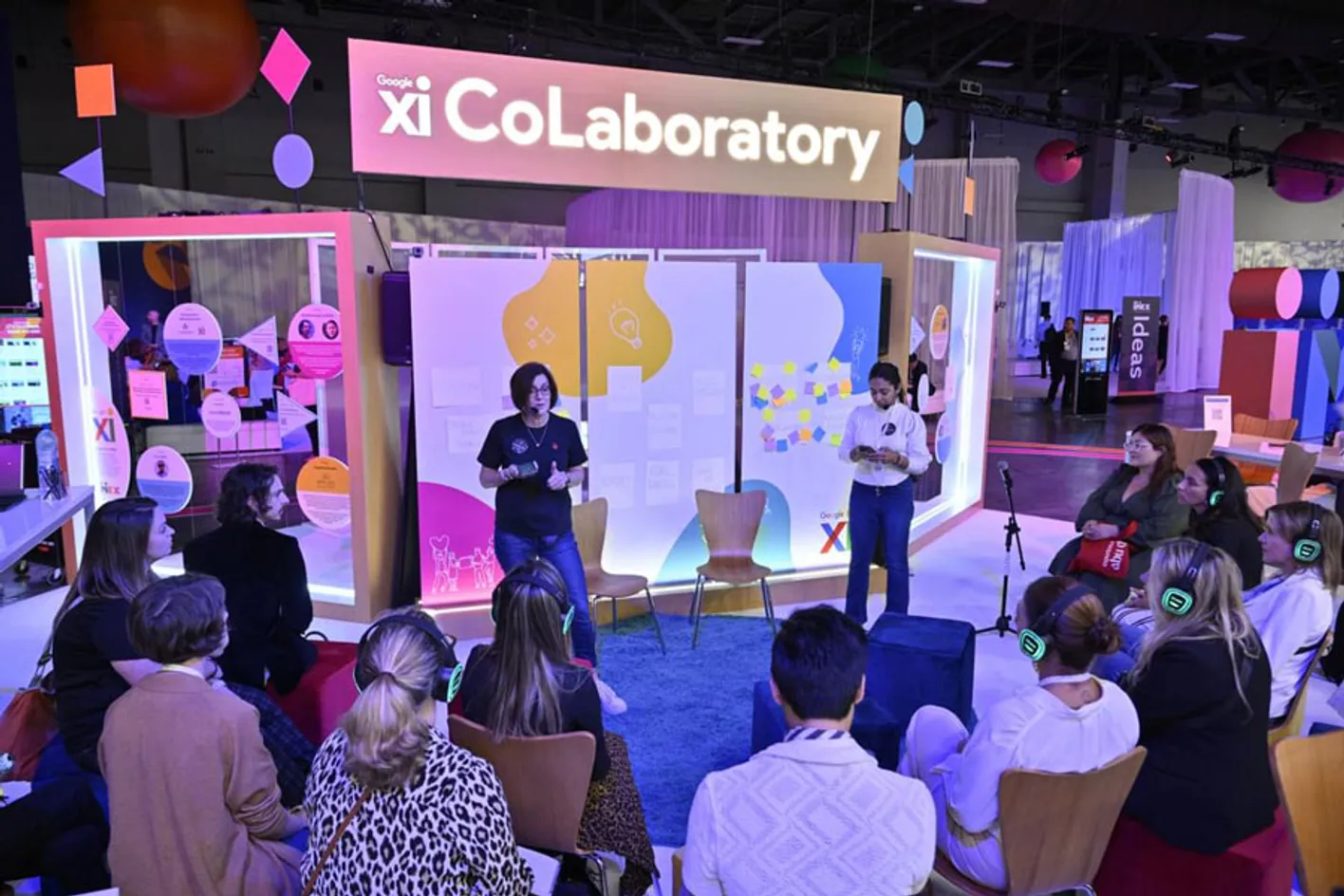 Crowd gathered at the Inspiration Hub for a live talk on future trends at IMEX