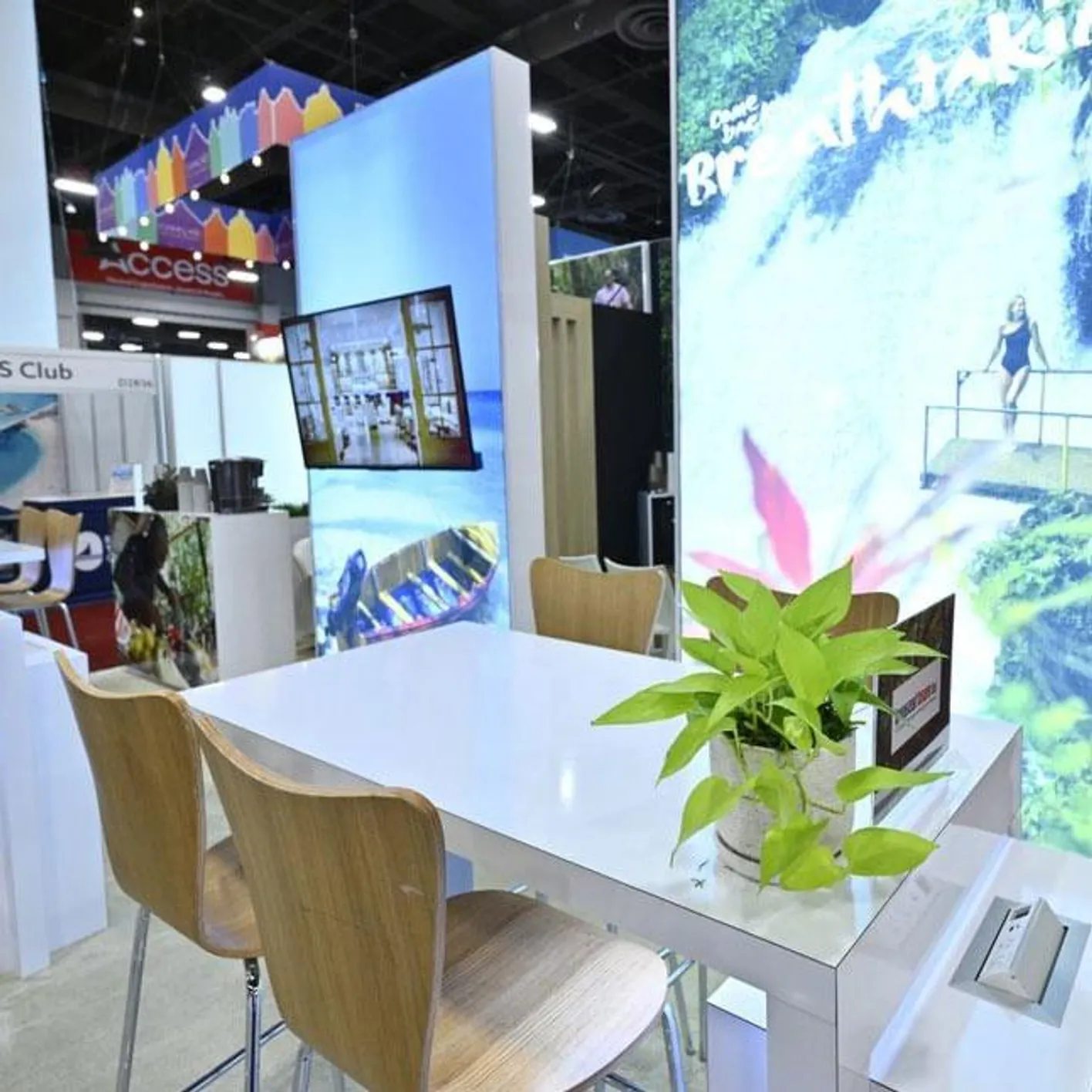 Clean and fresh exhibitor booth with greenery