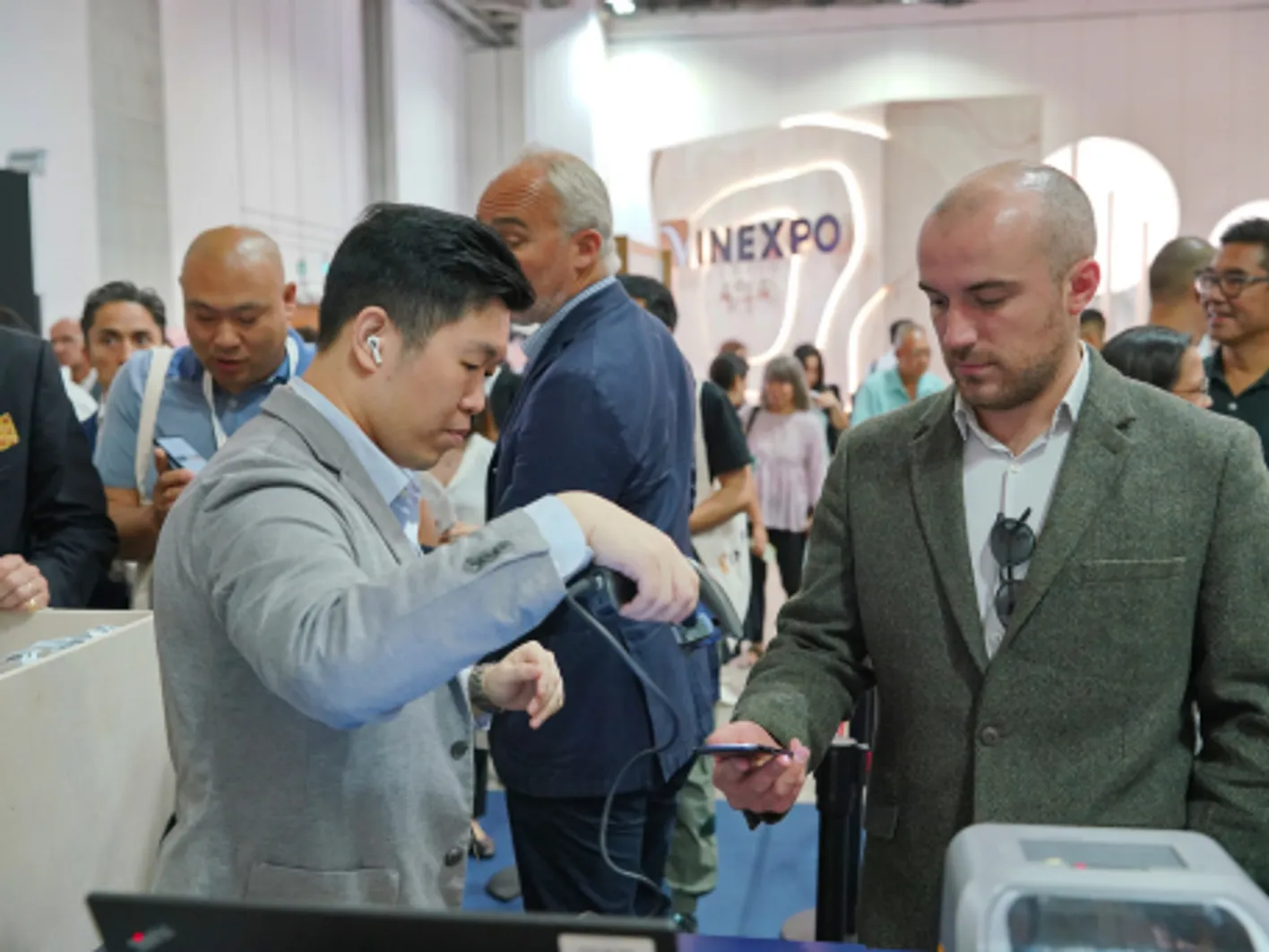 Wine professionals at the entrance at Vinexpo Asia