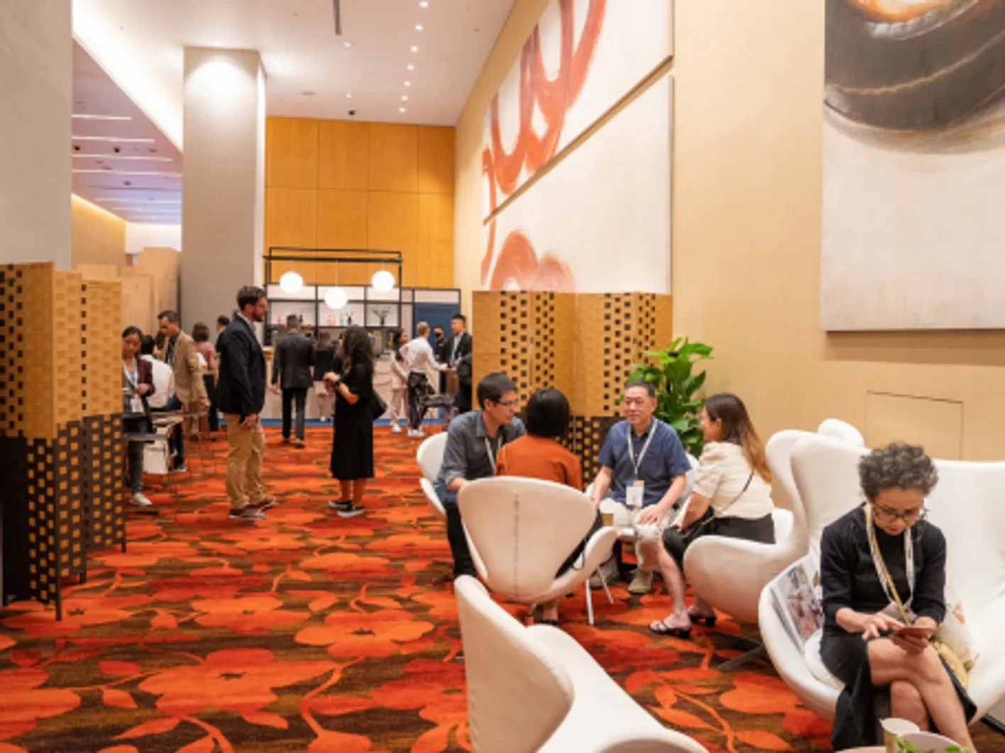 Buyers and guests networking in a lounge area at Vinexpo Asia