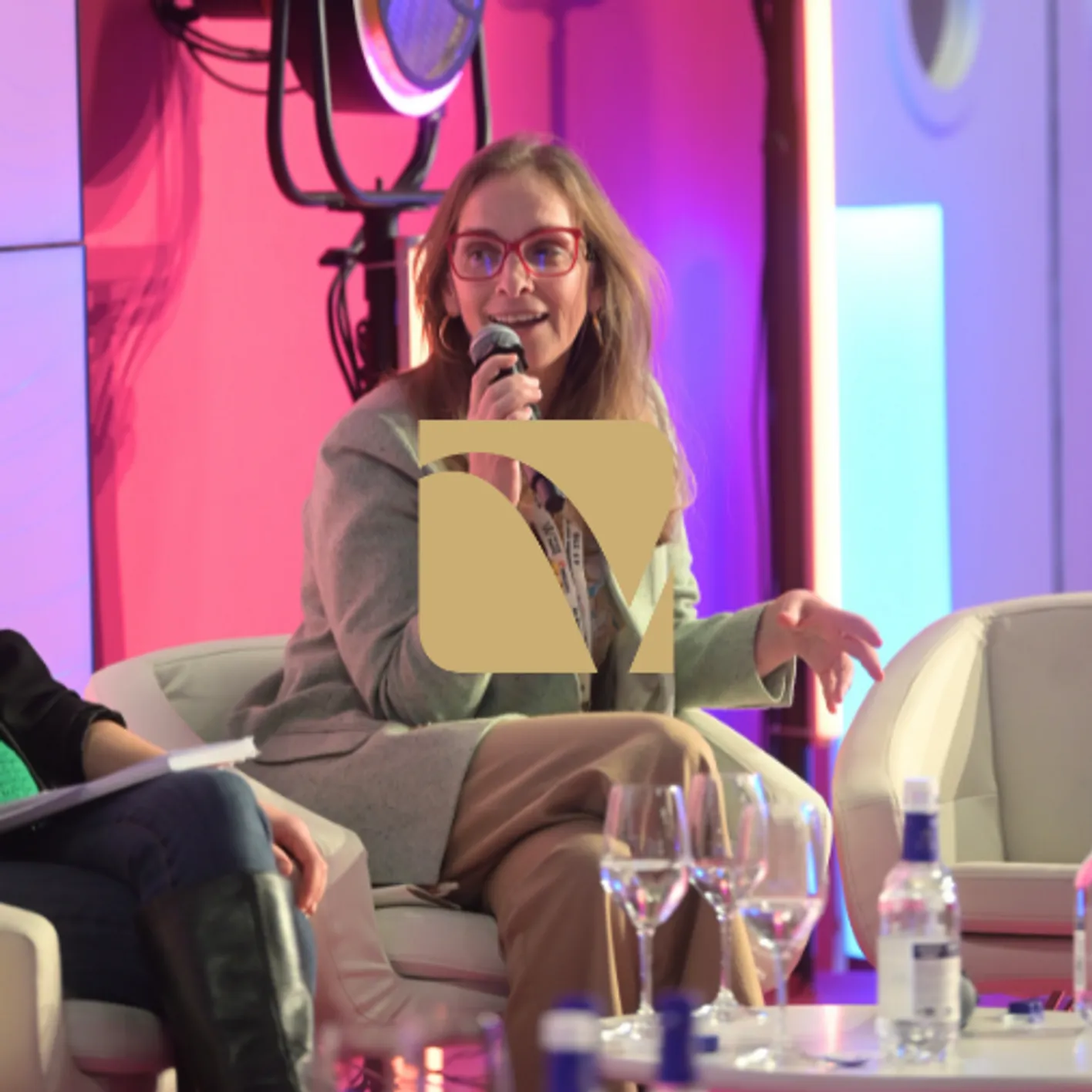 Speaker addressing audience during a Vinexpo Asia conference panel