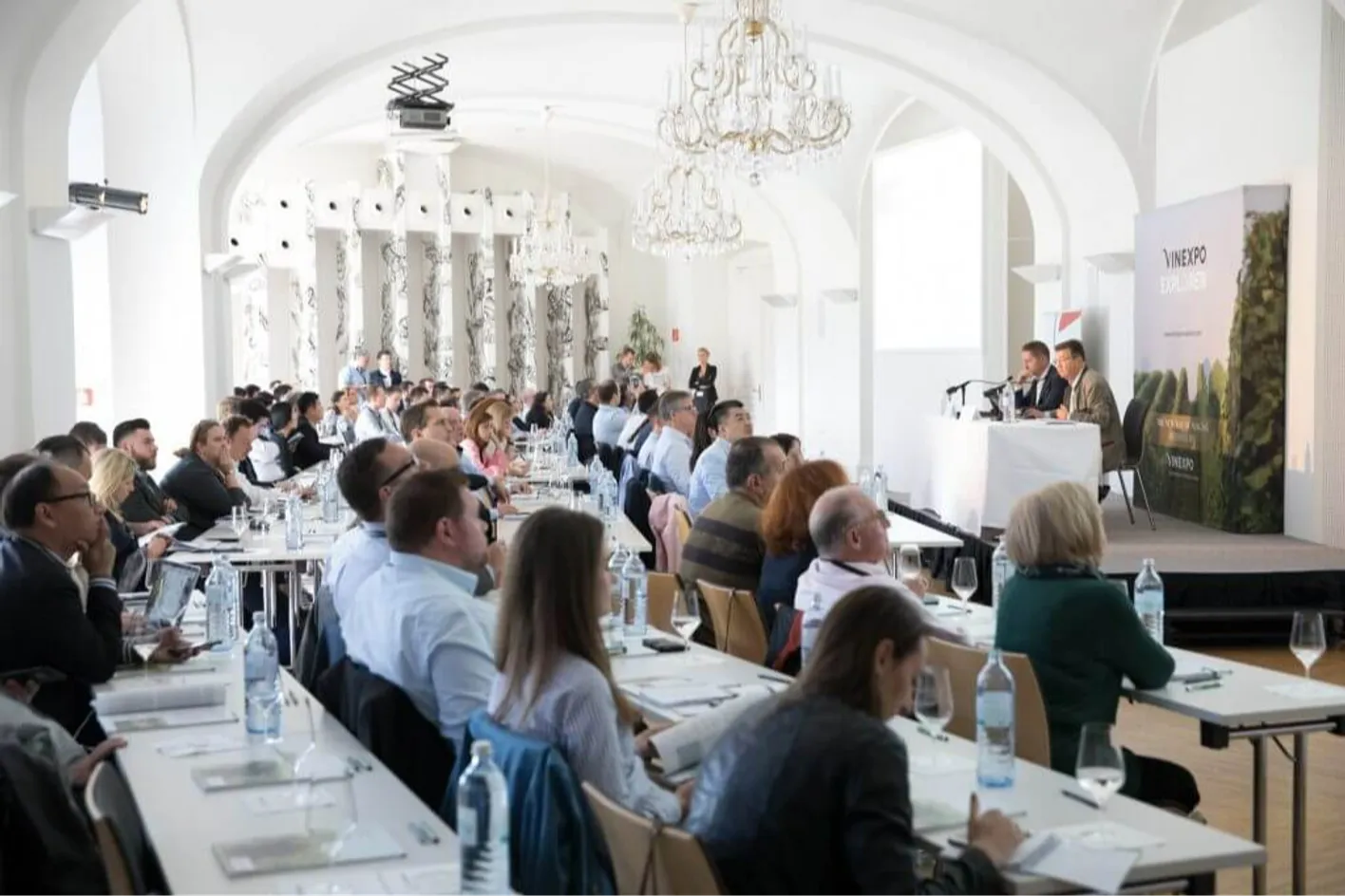 Many people attending a meeting in Austria.