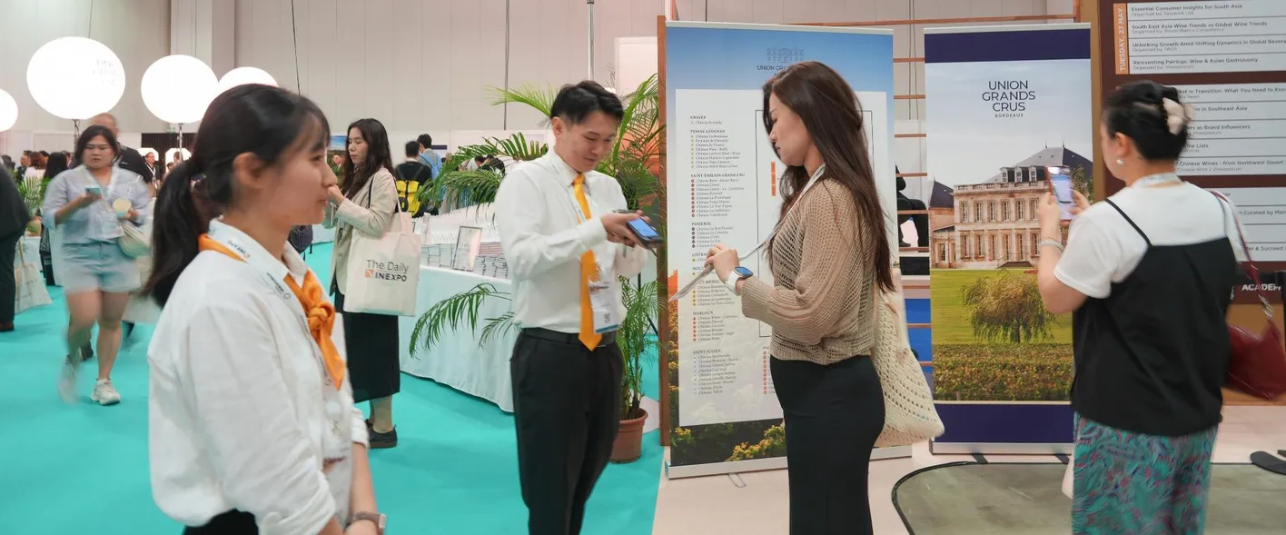 Sacnning badges at the entrance at Vinexpo Asia 