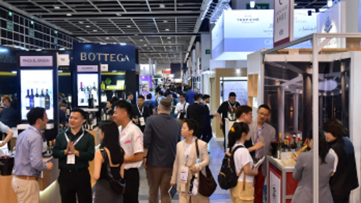 Crowds of visitors walking through Vinexpo Asia trade show floor