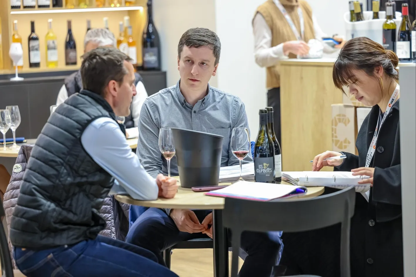 Business professionals scheduling B2B meetings online before Wine Paris