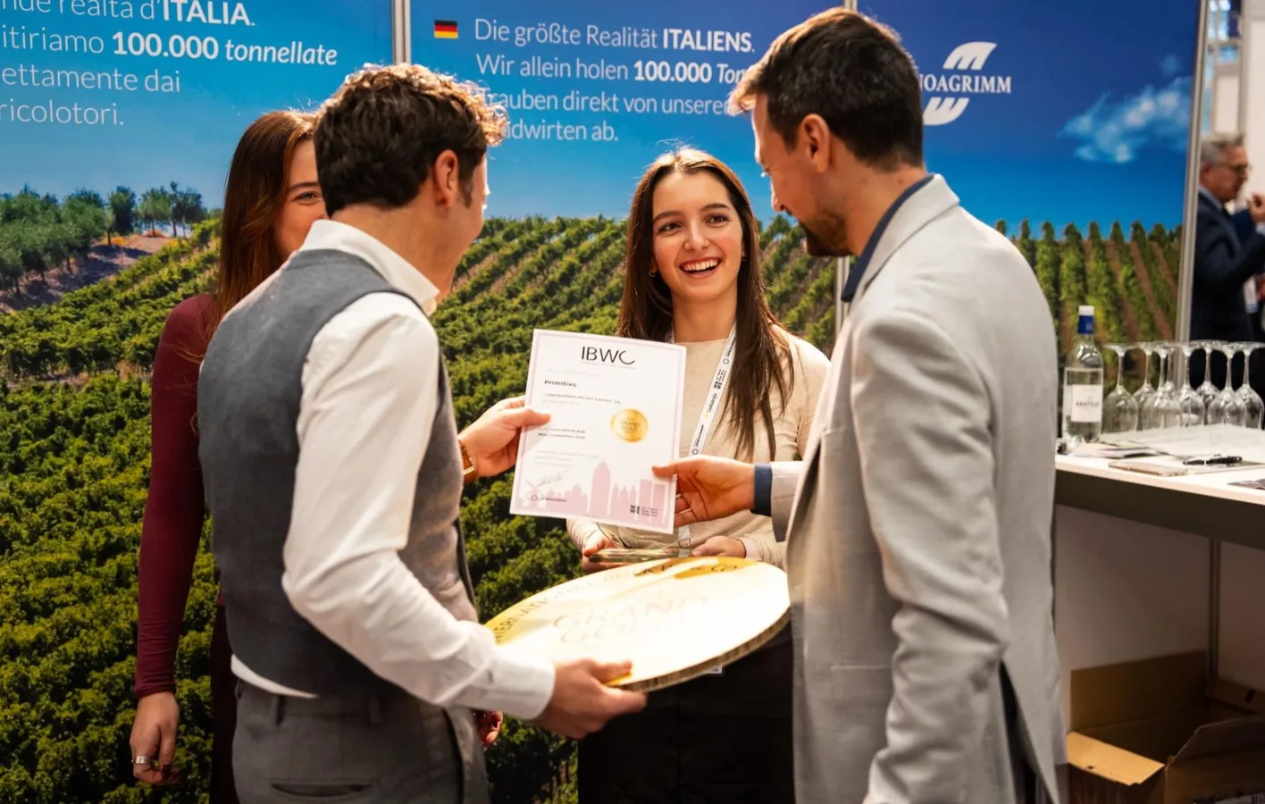 People who are enjoying because they were awarded of the International Bulk Wine Competition (IBWC)