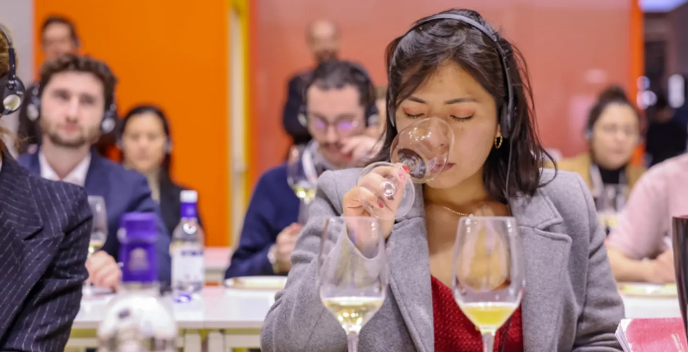 Participant tasting wine during a session at Wine Paris Academy.