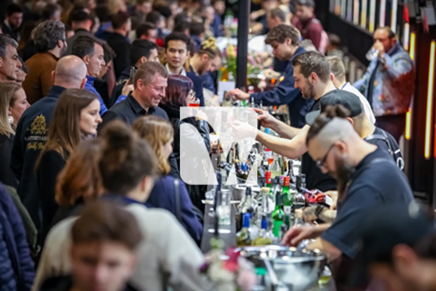 A dozen of people gathered in the Infinite Bar, a space where bartenders & mixologist serve cocktail