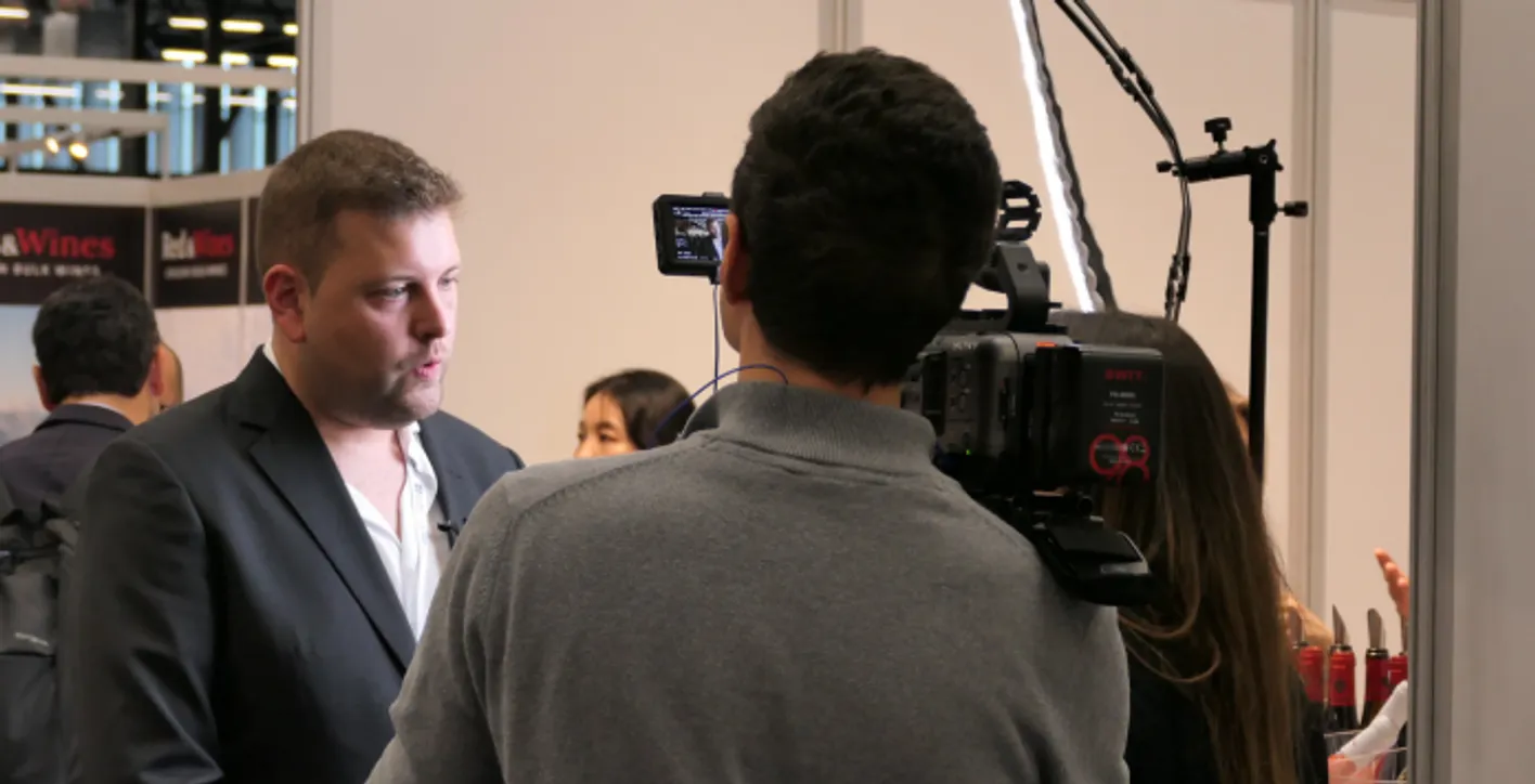 Interview of a man during the 16th edition of the exhibition WBWE.