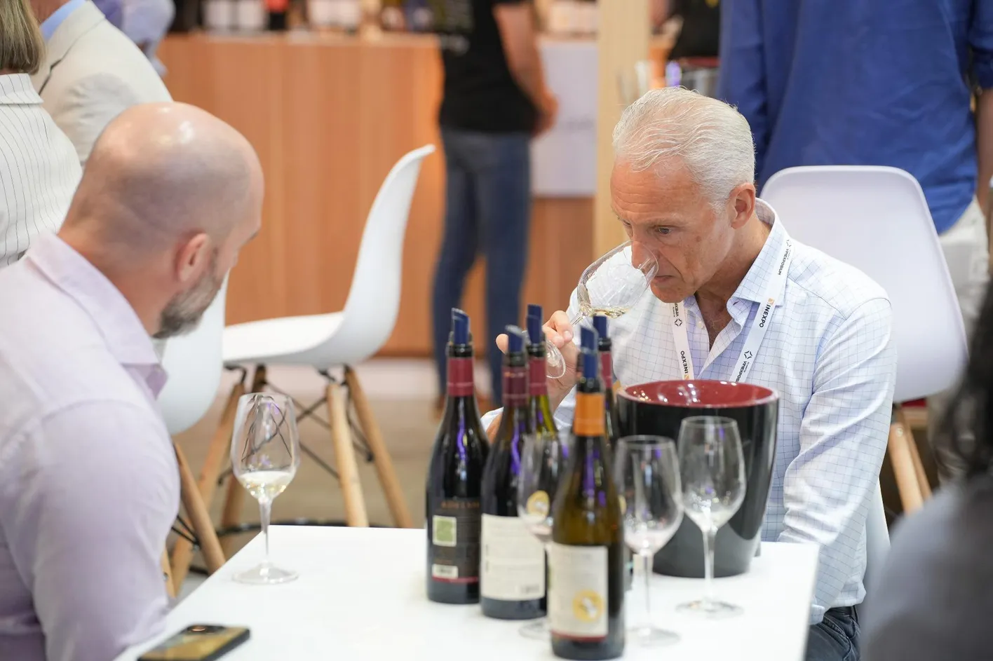Large crowd of wine professionals and visitors at Vinexpo Asia exhibition area
