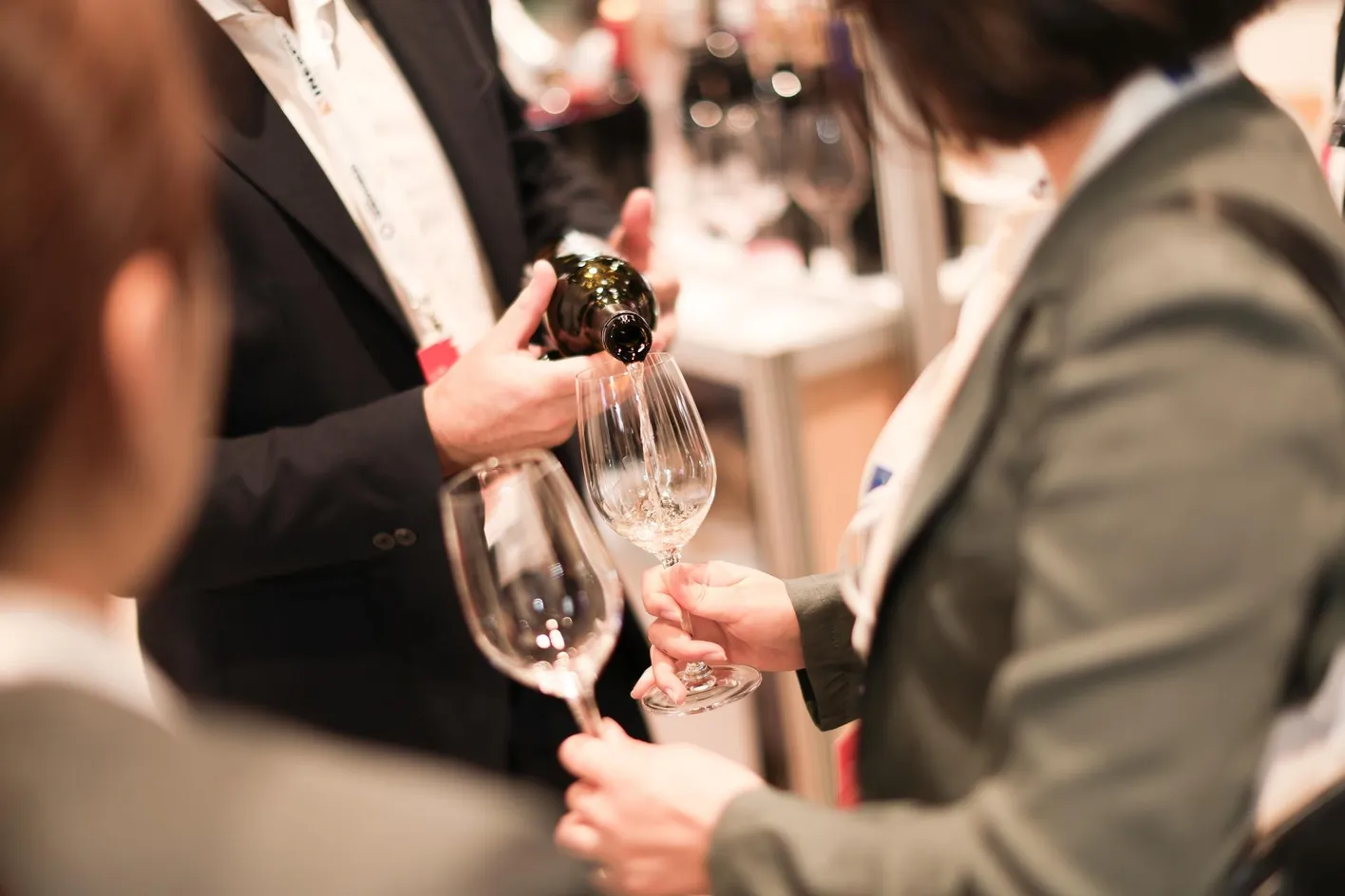 Large crowd of wine professionals and visitors at Vinexpo Asia exhibition area