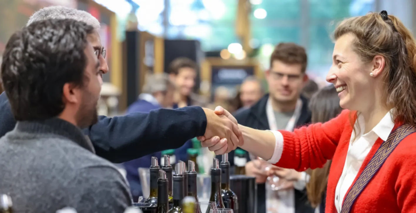 Large crowd of wine professionals and visitors at Vinexpo Asia exhibition area