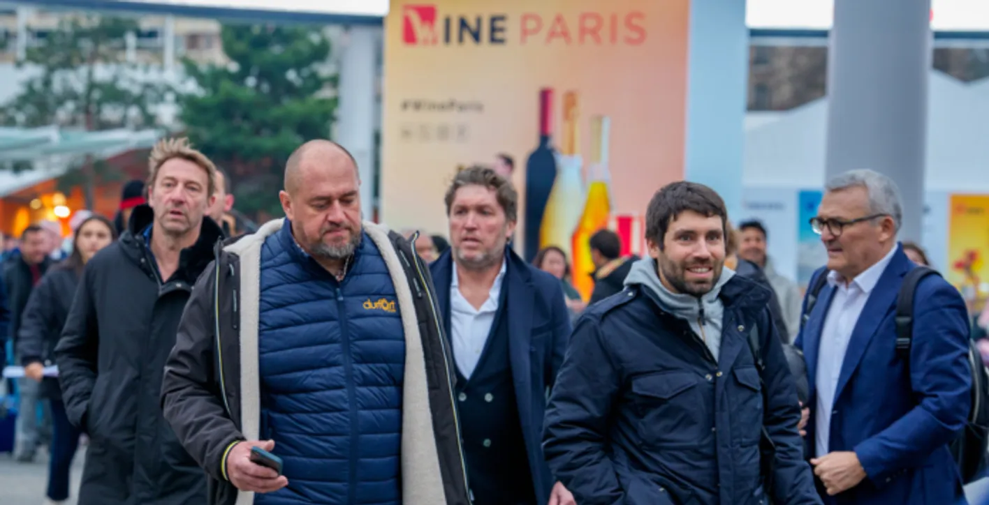 Wine exhibitors presenting and networking at Wine Paris expo