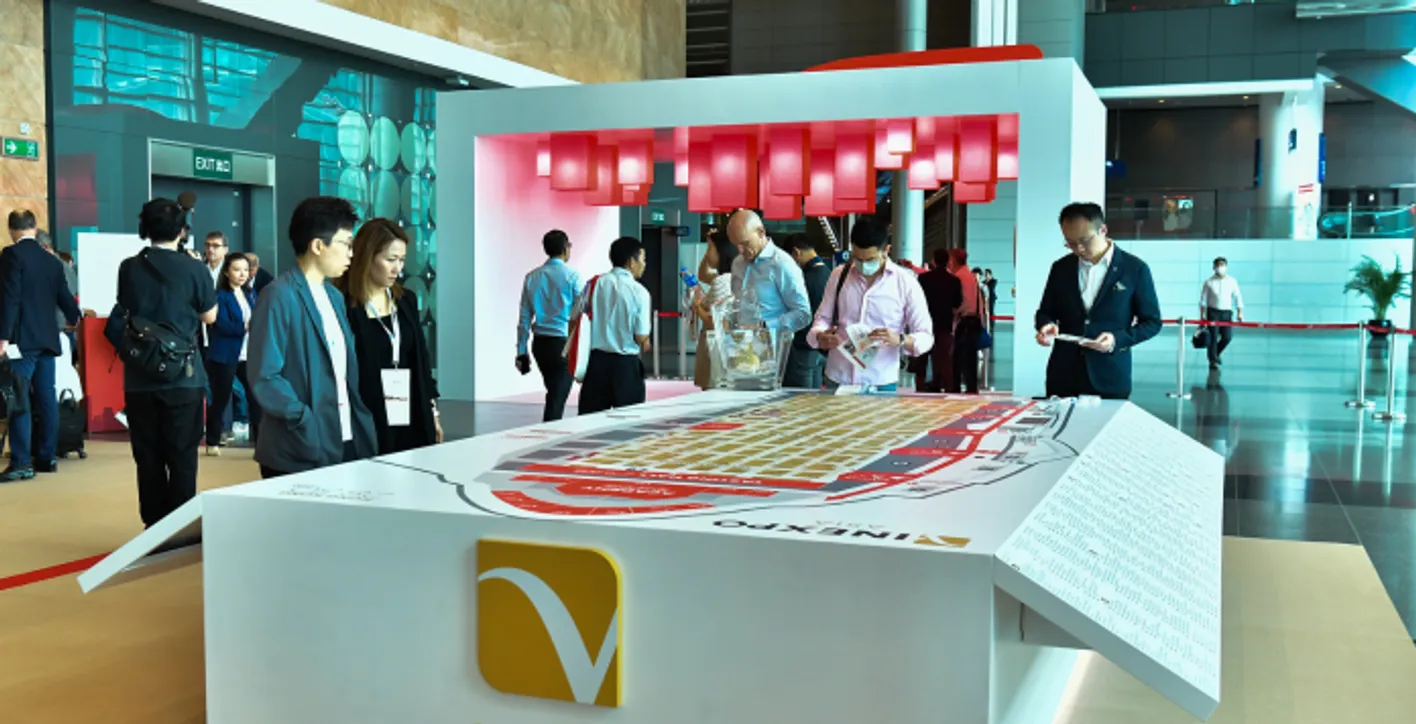 Large crowd of wine professionals and visitors at Vinexpo Asia exhibition area