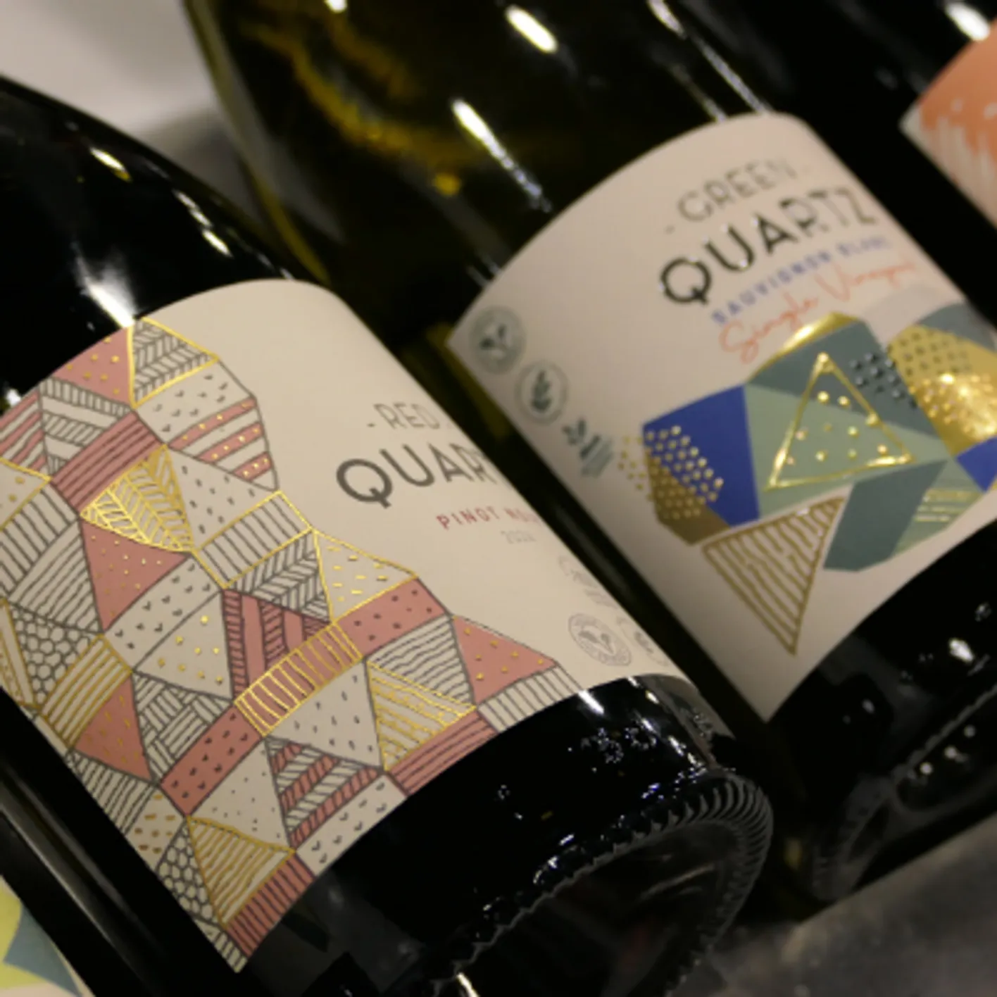 Two bottles of white wine from Green Quartz laid.