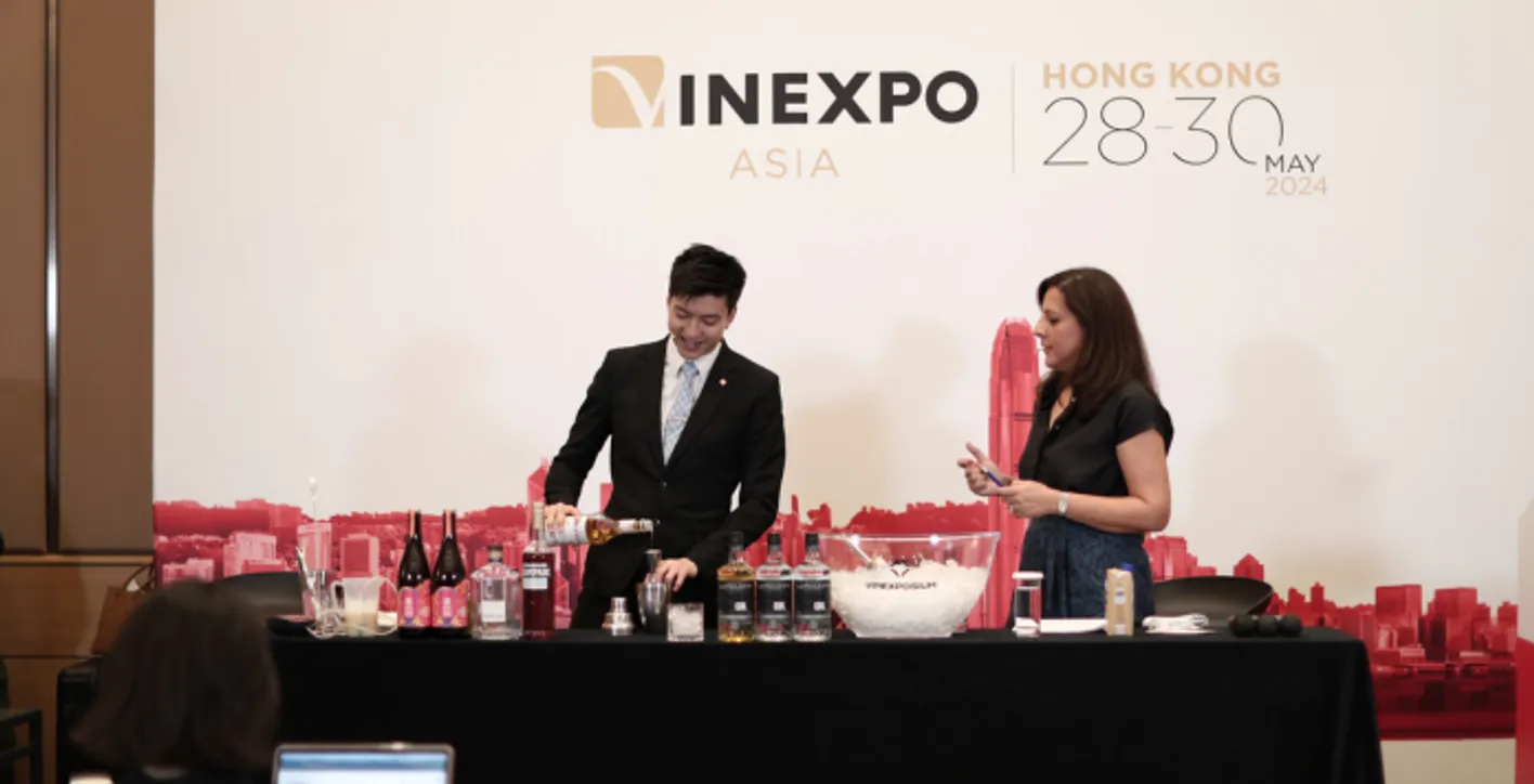 Large crowd of wine professionals and visitors at Vinexpo Asia exhibition area