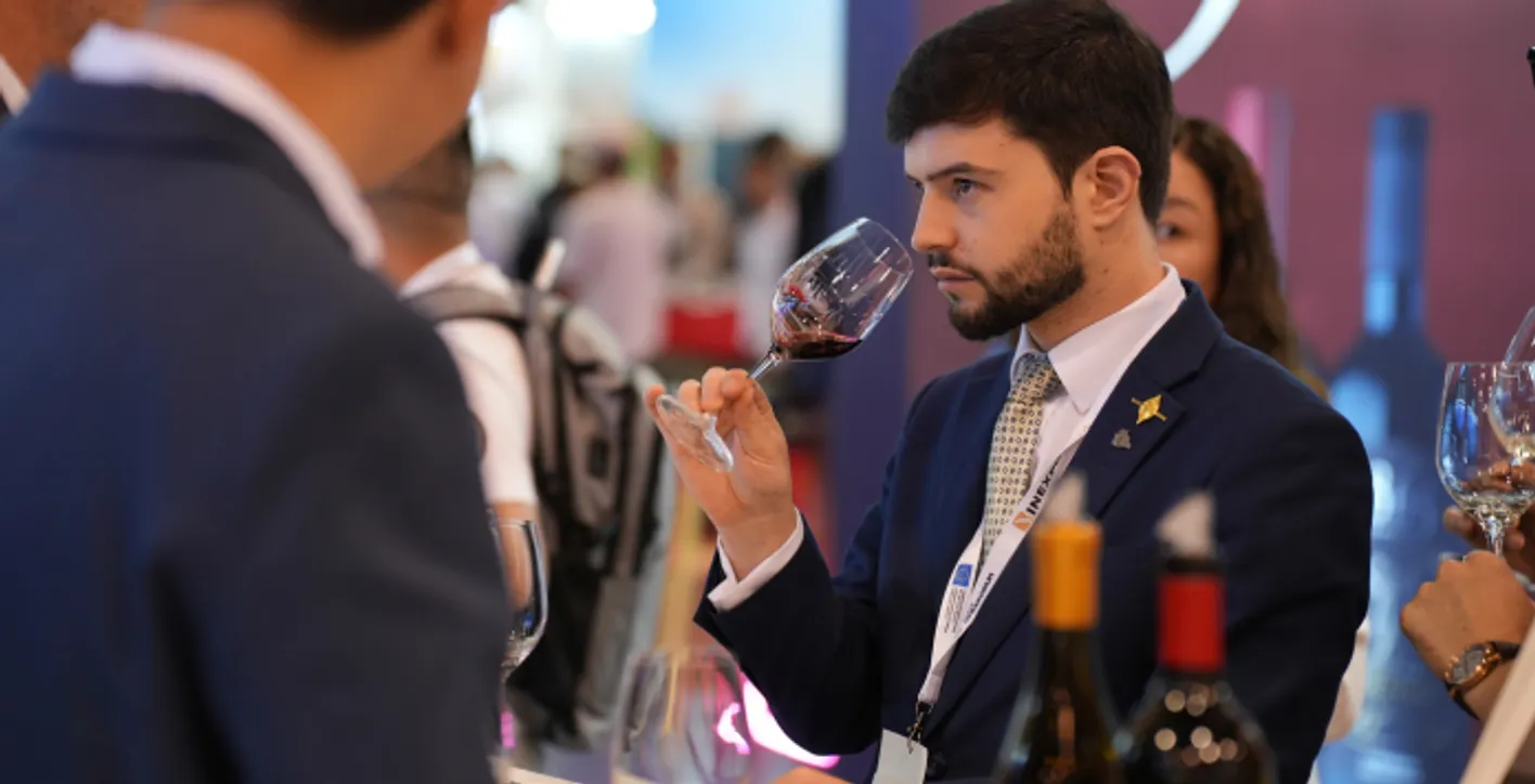 Large crowd of wine professionals and visitors at Vinexpo Asia exhibition area