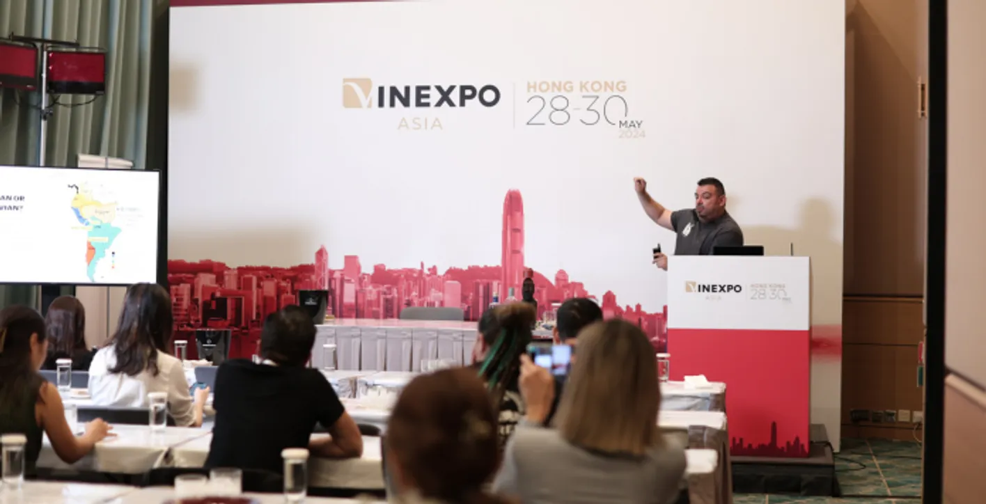 Large crowd of wine professionals and visitors at Vinexpo Asia exhibition area