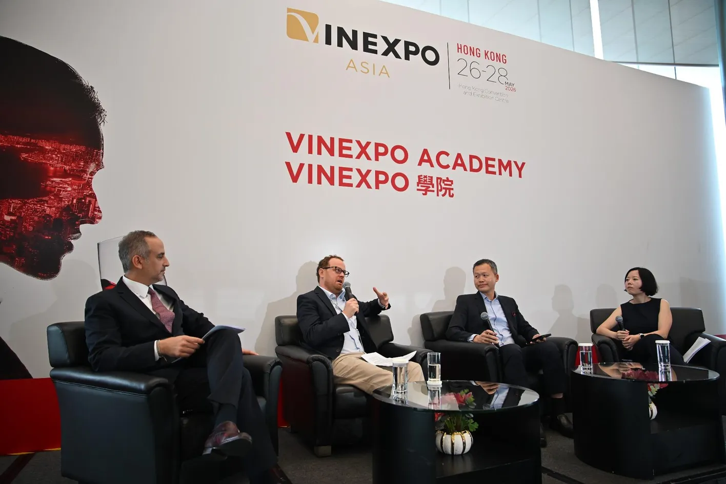 Speaker addressing audience during a Vinexpo Asia conference panel