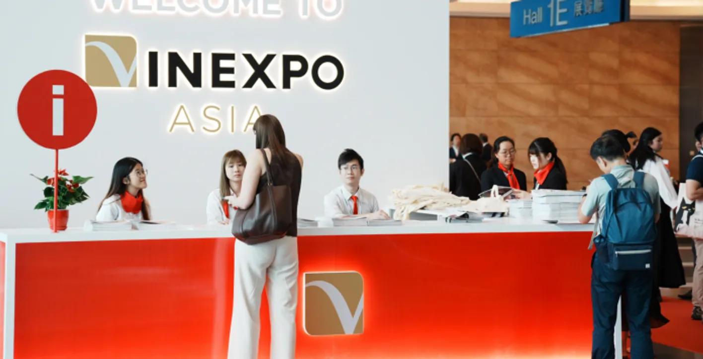 Large crowd of wine professionals and visitors at Vinexpo Asia exhibition area