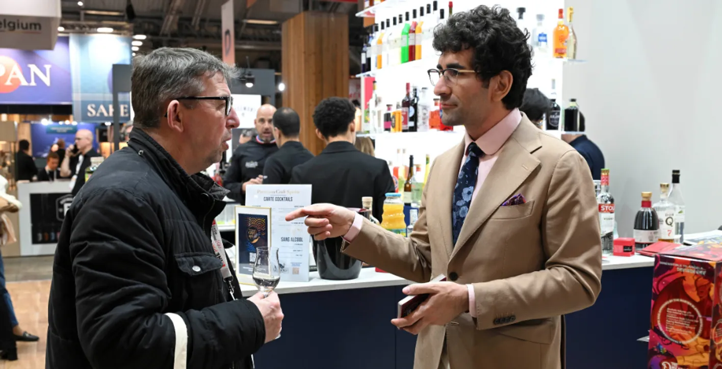 2 men talking business in wine paris