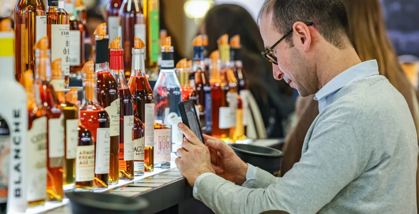 Visitors meeting wine professionals during Wine Paris international trade show