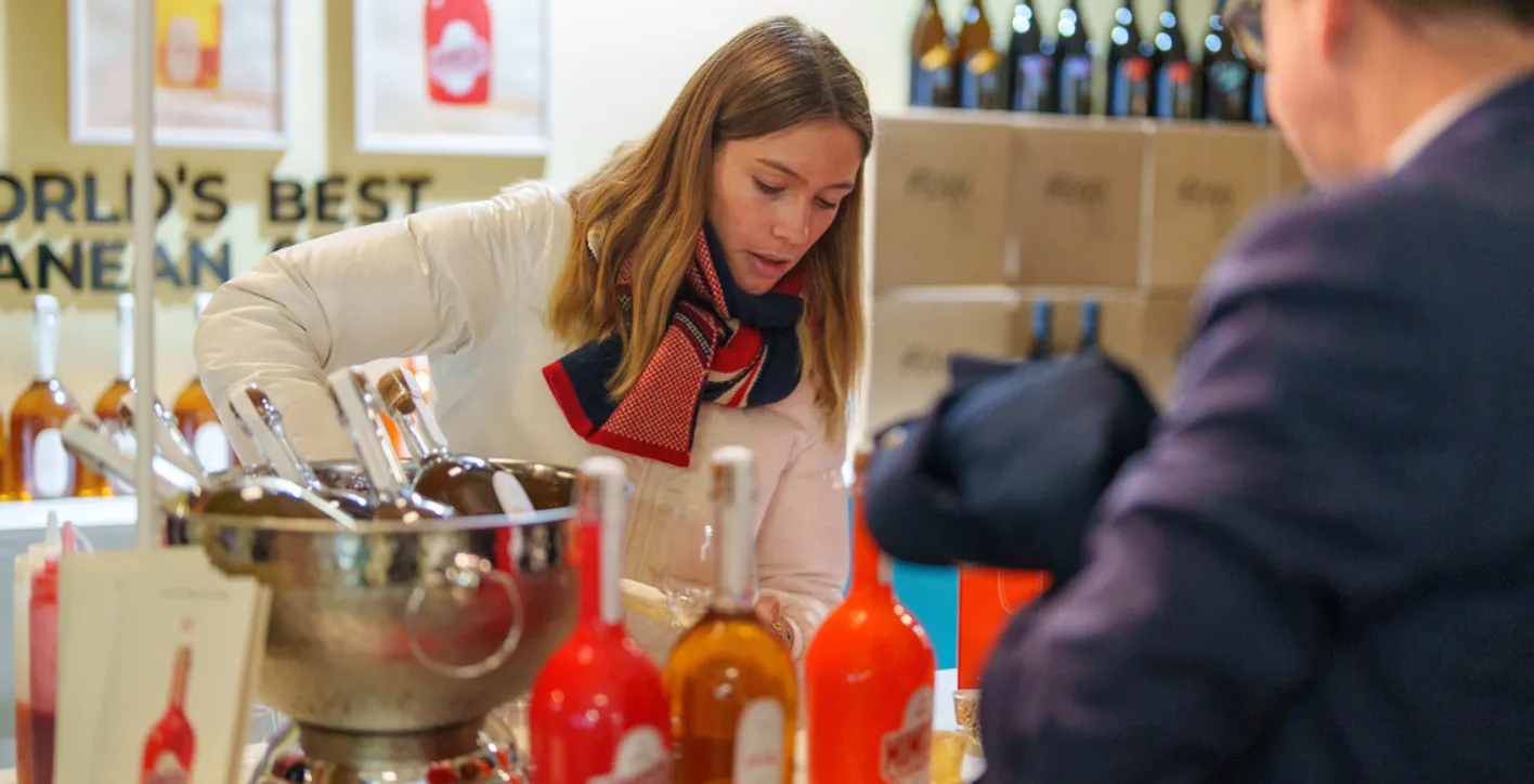 Visitors meeting wine professionals during Wine Paris international trade show