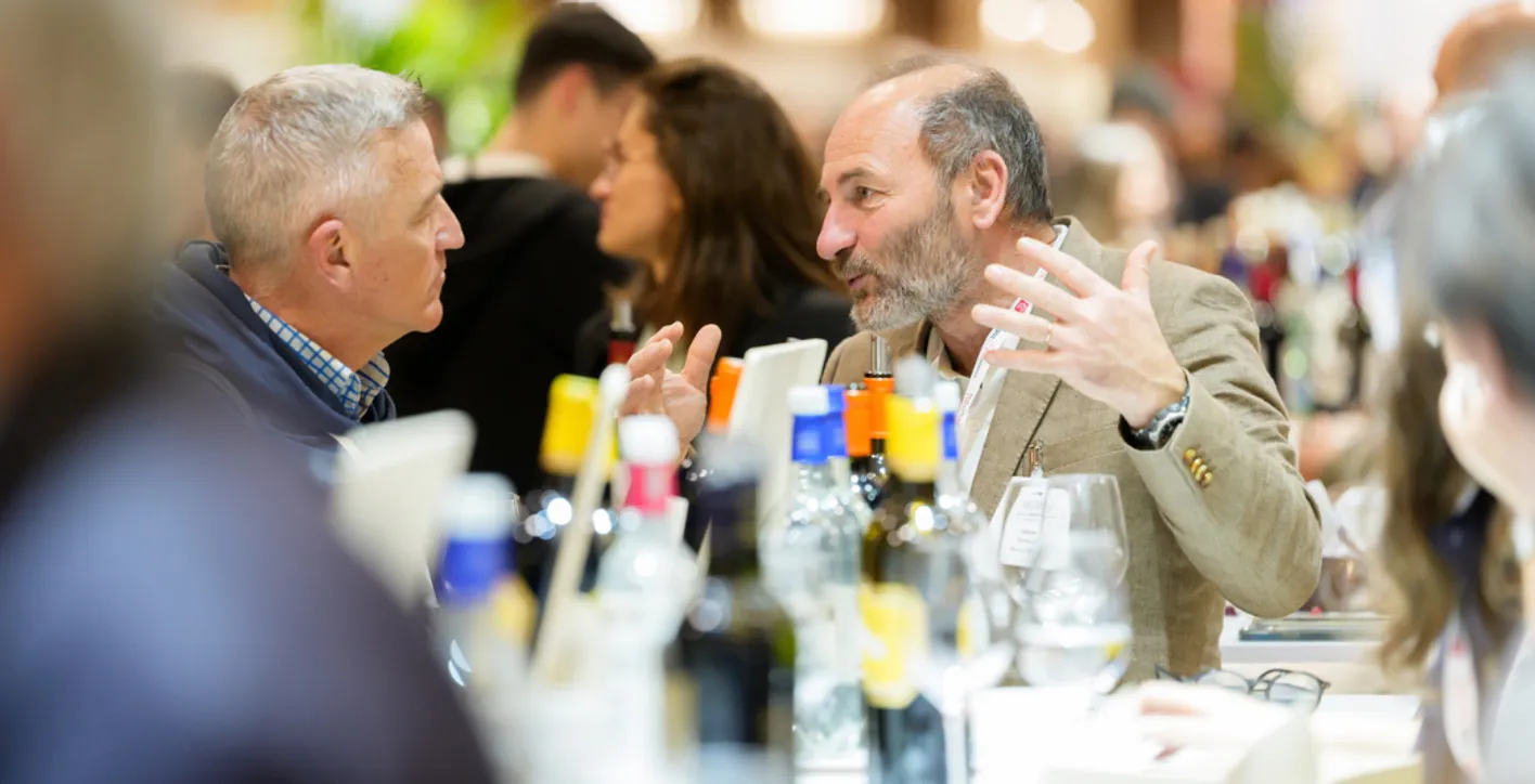 Visitors meeting wine professionals during Wine Paris international trade show